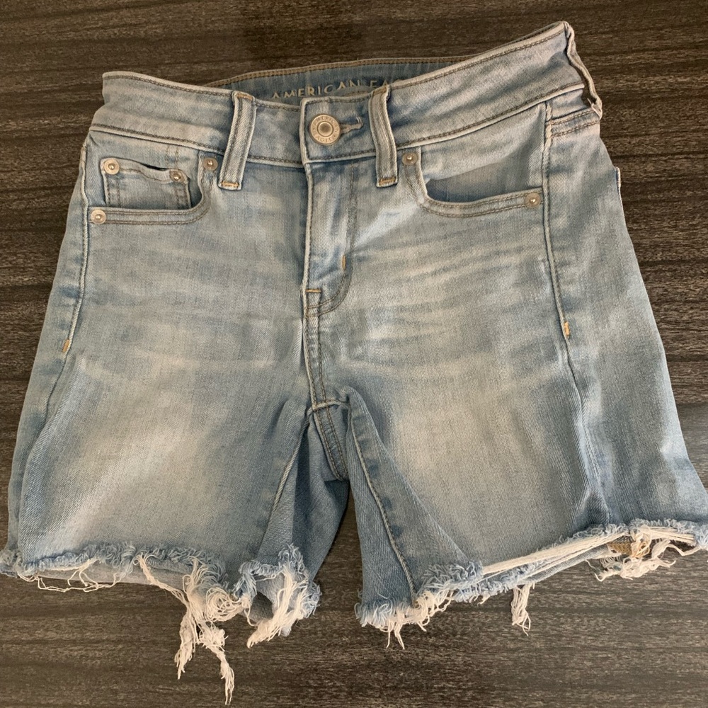American Eagle denim midi, distressed, light wash cut-off shorts size 0